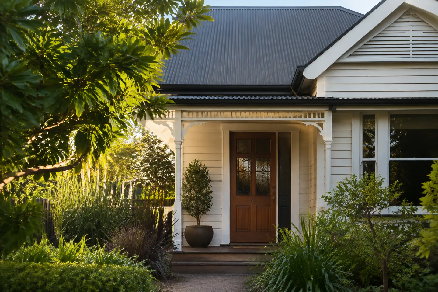 Illustrative New Zealand villa porch and metal gable roof